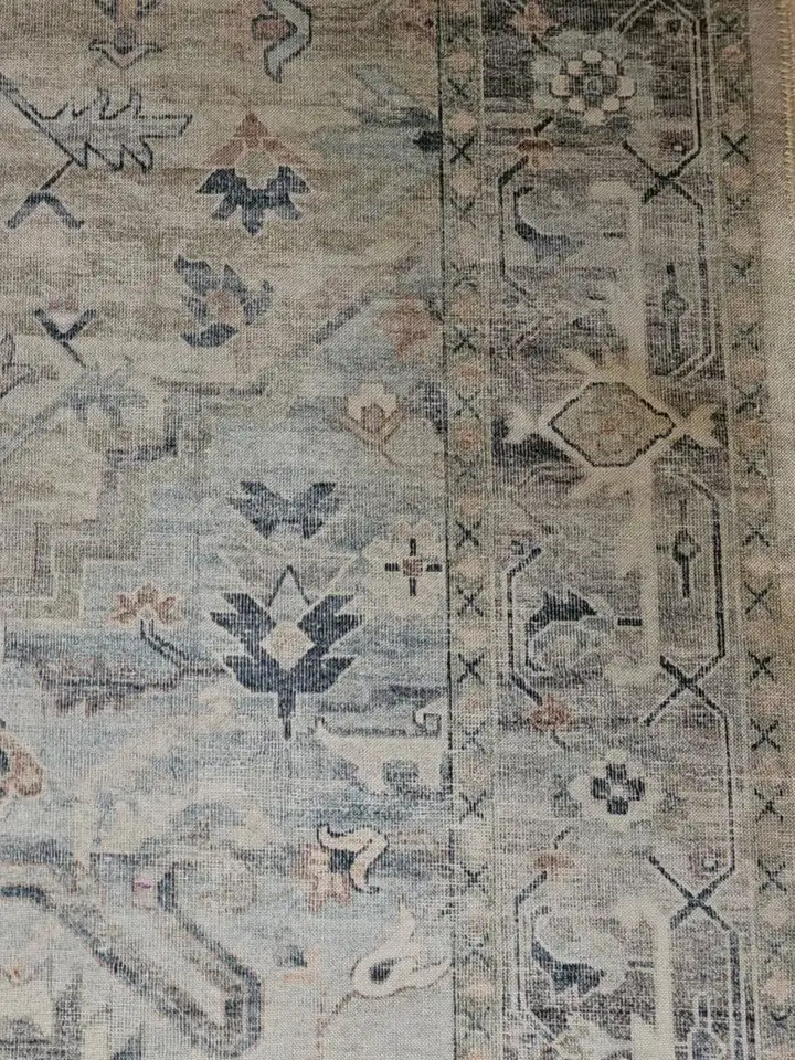 A patterned area rug after cleaning, with the colours bright again