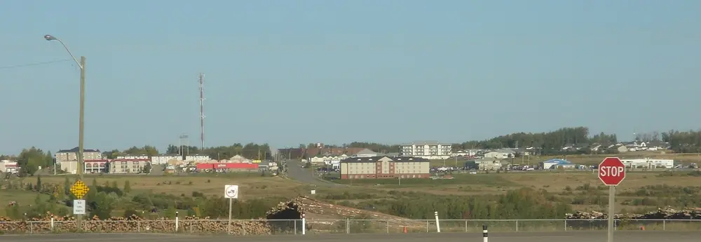 Drayton Valley seen from the south, with the town spread along the horizon